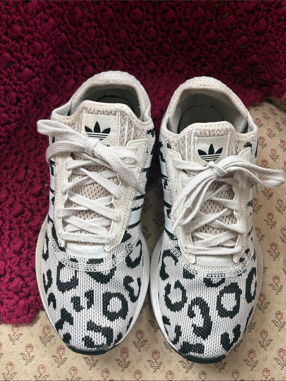 adidas woman’s White & Black Leopard Print Knit Sneakers